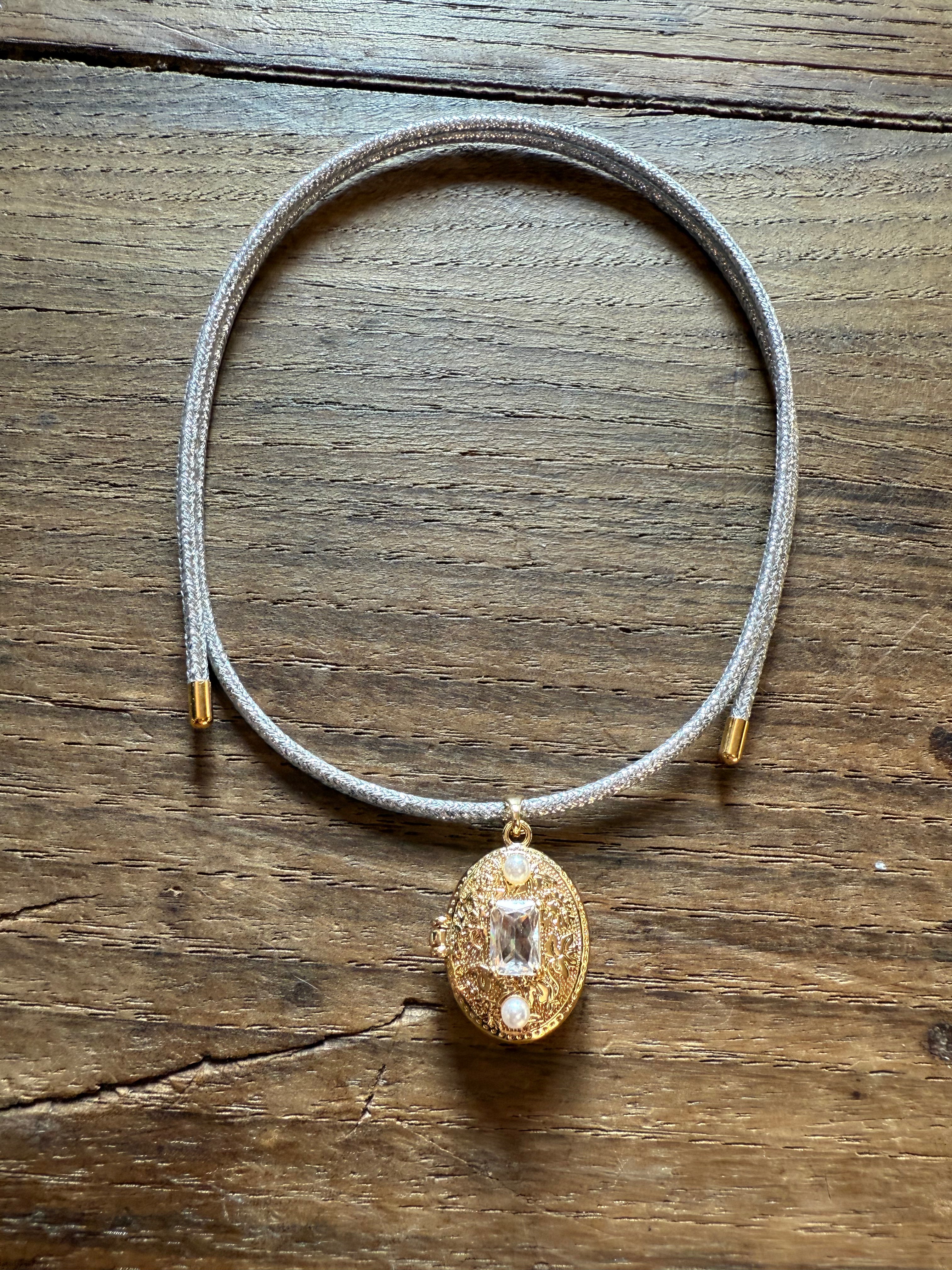 MAGNETIC CIONDOLO APRIBILE