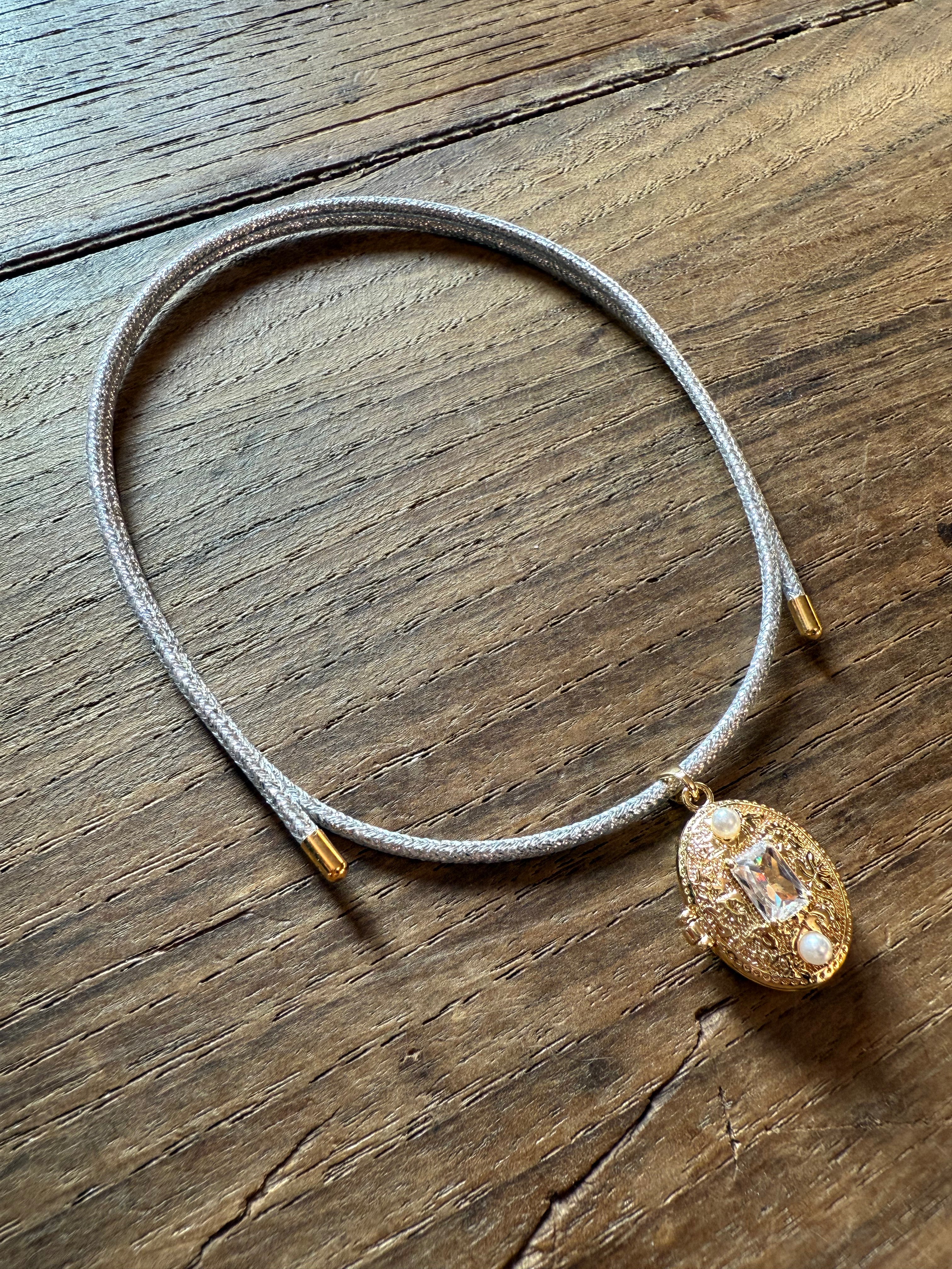 MAGNETIC CIONDOLO APRIBILE